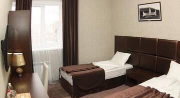 Фото номера Двухместный номер с 2 отдельными кроватями Гостиница Orient Hotel г. Пятигорск 3